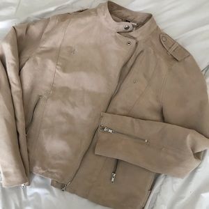 Beige color with silver tone jacket